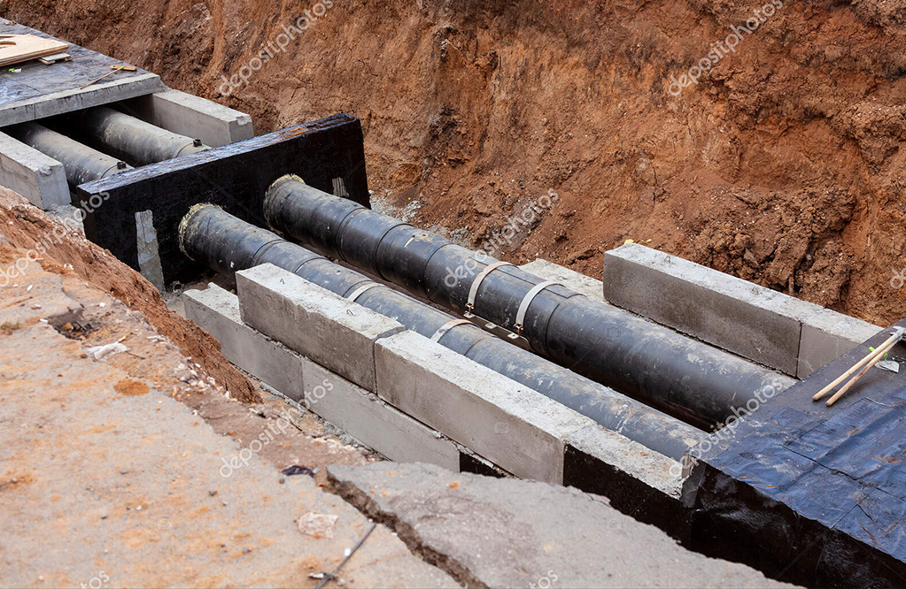 depositphotos_499088432-stock-photo-insulated-pipes-trench-water-main.jpg